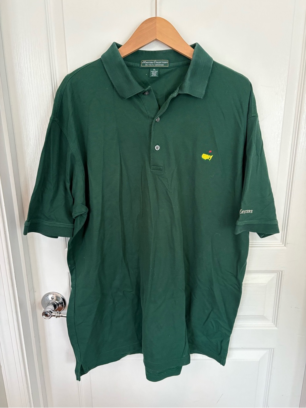 Master’s dark green polo